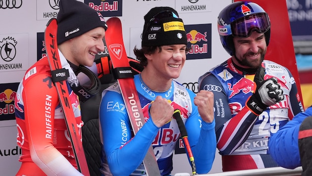 Giovanni Franzoni (center) wins ahead of Marco Odermatt (left) and Maxence Muzaton.