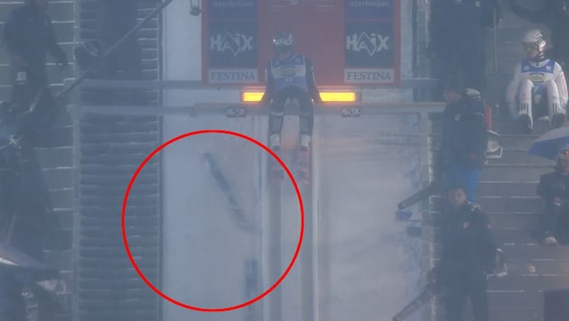 Suddenly, skis raced past Lindvik.