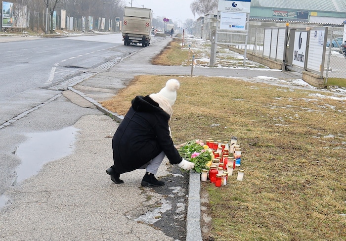 In memory of Martin, friends and family laid flowers at the scene of the crime.