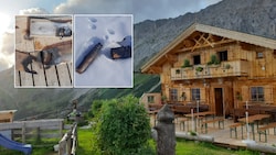 Verkohlte Bretter, ein Loch im Terrassenboden und angebranntes Holz vor der Hütte: Die ...