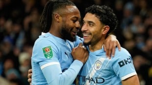 Antoine Semenyo (l.) und Omar Marmoush von Manchester City