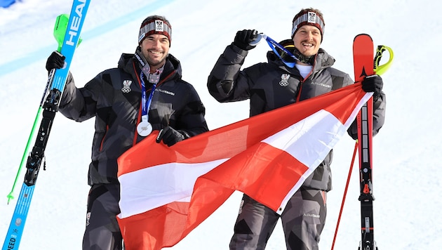 Vincent Kriechmayr (left) and Manuel Feller (right) raced to the silver medal on Monday.