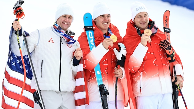 Ryan Cochran-Siegle, Franjo von Allmen, and Marco Odermatt (from left to right)