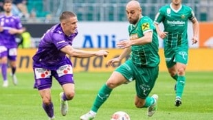 Trotz Krise sieht Rapids Grgic (re.) Siegchancen.