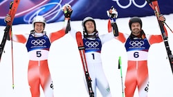 Marco Odermatt, Lucas Pinheiro Braathen und Loic Meillard (von li. nach re.)