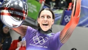 Janine Flock lächelt der immer näher rückenden Goldmedaille entgegen.