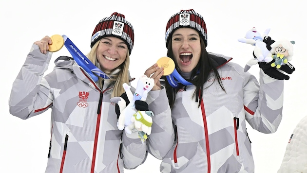 Olympia-Gold im Team: Rädler (li.) und Huber.