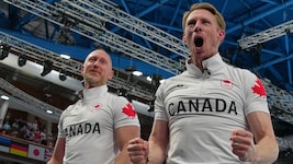 Das kanadische Team um Marc Kennedy (r.) jubelt über Gold.