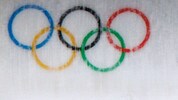 Die olympischen Ringe in Mailand und Cortina.