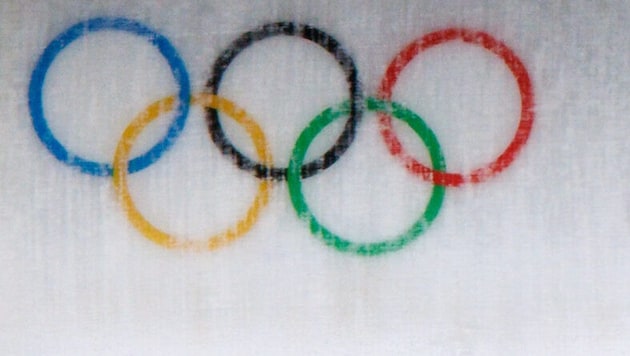 Die olympischen Ringe in Mailand und Cortina.