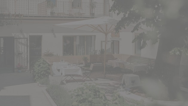 Der Gastgarten des Boutiquehotels Zum Goldenen Hirschen