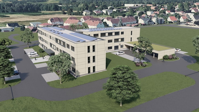 Das zukünftige Gebäude wird drei Geschosse haben. Der längere Teil, der parallel zur B70 ...