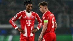 Michael Olise (l.) und Joshua Kimmich (r.) sahen gegen Atalanta die Gelbe Karte.