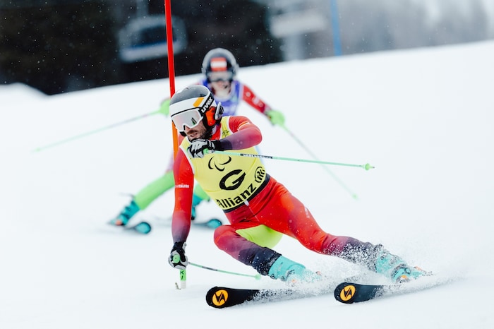 As her guide, Eric Digruber led Veronika Aigner to victory in the slalom.