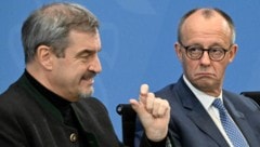 Bayerns Ministerpräsident Söder (li.) widerspricht Bundeskanzler Merz. (Archivbild)