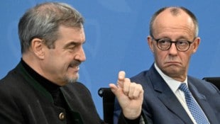 Bayerns Ministerpräsident Söder (li.) widerspricht Bundeskanzler Merz. (Archivbild)
