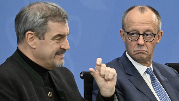 Bayerns Ministerpräsident Söder (li.) widerspricht Bundeskanzler Merz. (Archivbild)