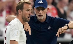 Englands Nationaltrainer Thomas Tuchelmit Harry Kane.