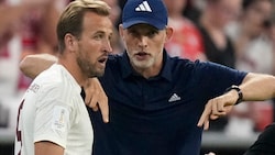 Englands Nationaltrainer Thomas Tuchelmit Harry Kane.