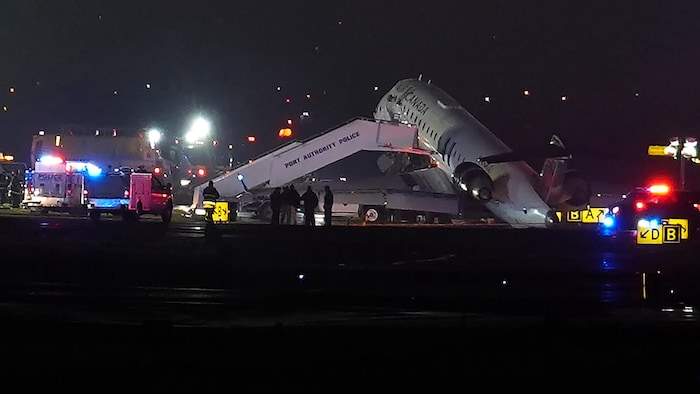 The nose of the aircraft is severely damaged.