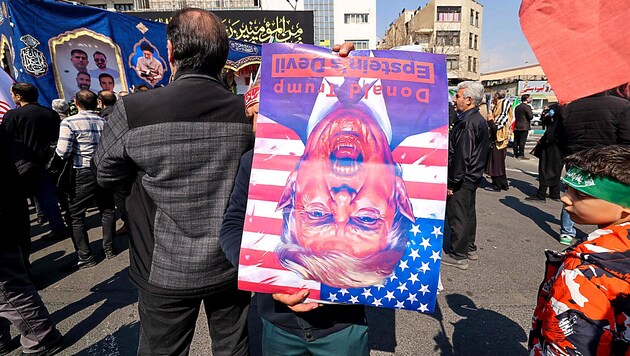 Supporters of the Iranian regime are protesting the attacks by the U.S. and Israel and view U.S. ...