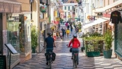 Fahrradtouristen bevölkern immer mehr die malerischen Gassen der portugiesischen Metropole.