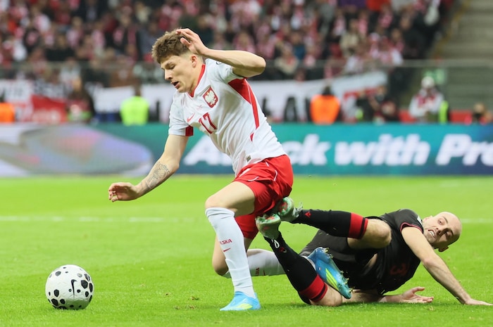 Filip Rozga (l. beim Sieg gegen Albanien) träumt mit Polen von der WM.