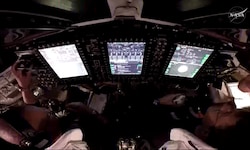 Pilot Victor Glover (li.) und Kommandant Reid Wiseman in der Orion-Kapsel