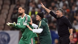 Goalie Gianluigi Donnarumma (l.) und der nunmehrige Ex-Teamchef Gennaro Gattuso litten gegen ...