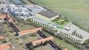 Das neue NÖM-Versandlager fügt sich mit seiner Fassade perfekt in die Landschaft.