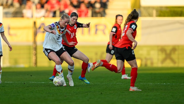 Our women’s soccer team fought hard to earn a point against the overwhelming German team.