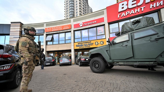 The shooter from Kyiv fled into this supermarket and was killed there shortly afterward by law ...