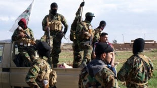 Archivbild aus dem Jahr 2015: Mitglieder der Schiiten-Miliz Asaib Ahl Al-Haq