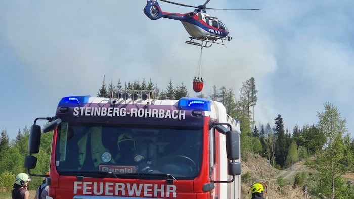 Firefighting efforts in the steep and rugged terrain are extremely challenging.