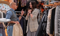 Stanley Tucci und Anne Hathaway als Nigel und Andy