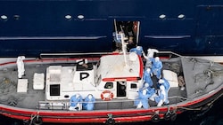 Gesundheitspersonal beim Kreuzfahrtschiff „MV Hondius“, auf dem das Hantavirus ausgebrochen ist