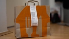 Meist ein Grund zur Freude, wenn das bestellte Essen endlich angekommen ist. 