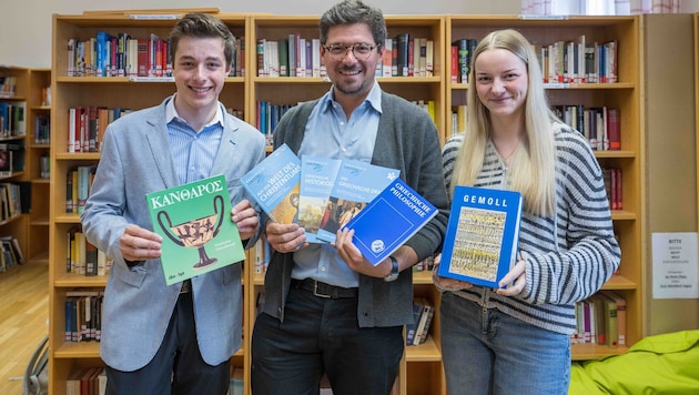 Konstantin Hofer (17), Lehrer Markus Lienhart und Valentina Schubert (17) eint die Freude an ...