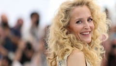 Gillian Anderson posierte in Cannes mit einer wilden Löwenmähne für die Fotografen. 
