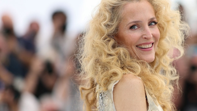 Gillian Anderson posierte in Cannes mit einer wilden Löwenmähne für die Fotografen.