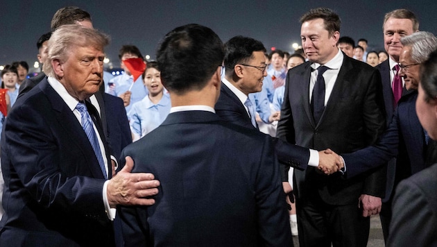 US-Präsident Donald Trump (links) hat sich gleich mehrere Vertraute nach China mitgenommen.