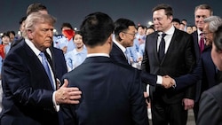 US-Präsident Donald Trump (links) hat sich gleich mehrere Vertraute nach China mitgenommen.