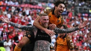 Oliver McBurnie, der Mann mit den vielen Tätowierungen, schoss Hull City zurück in die Premier ...