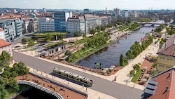 Breite Boulevards, gepflegtere Grünflächen, Cafés, Sportmöglichkeiten, eine Eventarena und vor ...