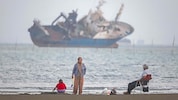 Iraner an einem Strand an der Straße von Hormuz