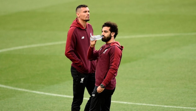 Bis 2020 kickten Dejan Lovren (l.) und Mohamed Salah (r.) gemeinsam beim FC Liverpool.
