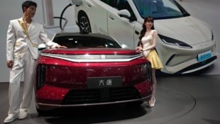 Großkonzerne wie der chinesische Autobauer BYD gelten in den USA jetzt als Militärunterstützer ...