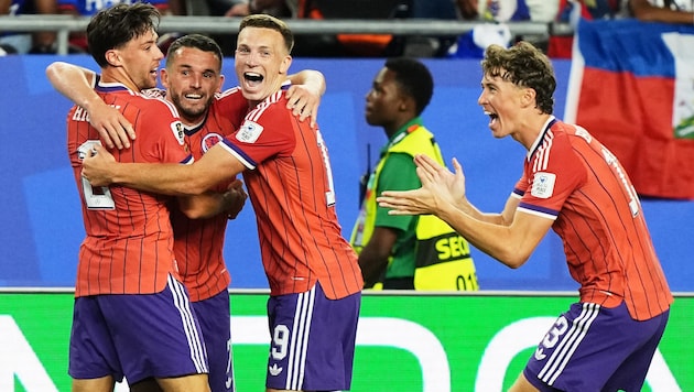 Scotland celebrates its first victory in a World Cup finals since 1990.
