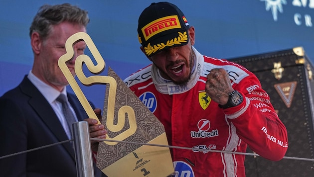 Lewis Hamilton (center) won the Catalan Grand Prix.