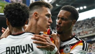 AFP/RONALDO SCHEMIDT Die deutschen Spieler schrieben am Sonntag WM-Geschichte.